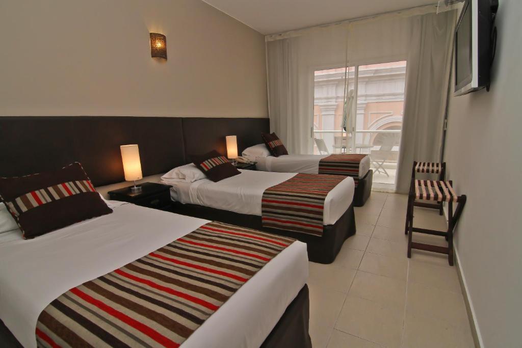 De La Plaza Hotel Maldonado Ruang foto