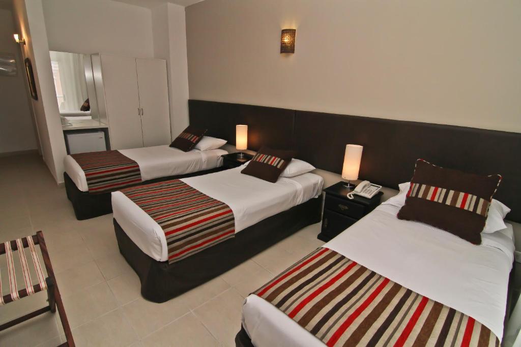De La Plaza Hotel Maldonado Ruang foto