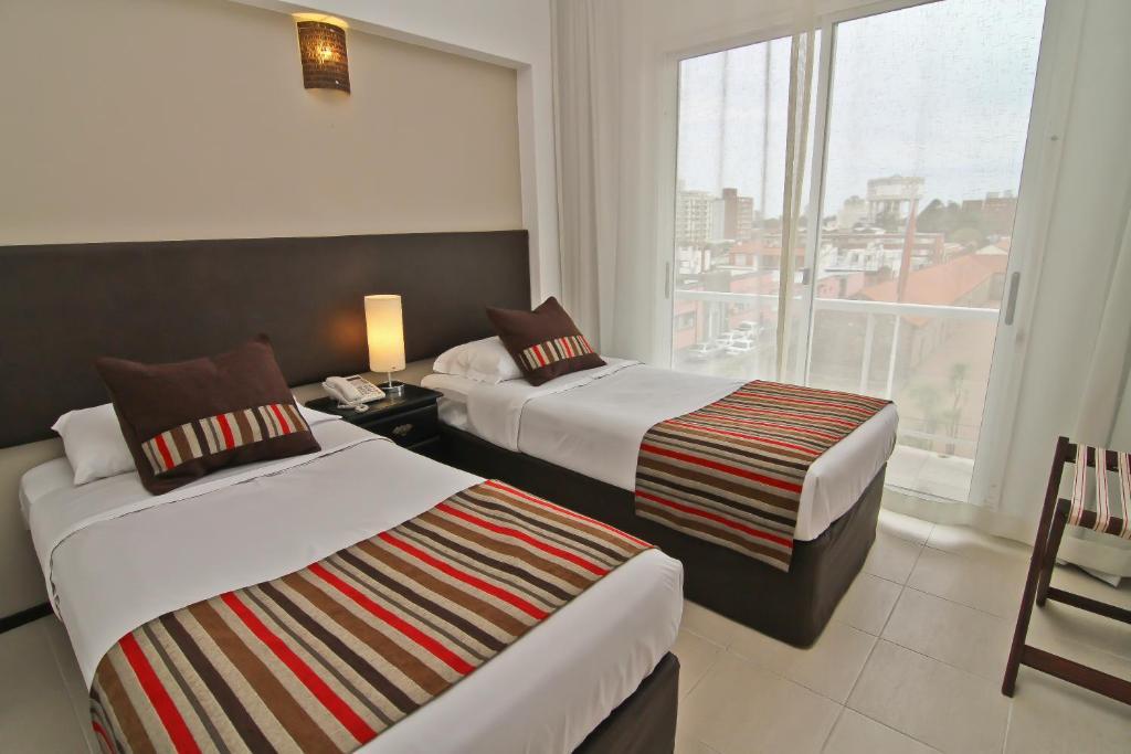 De La Plaza Hotel Maldonado Ruang foto